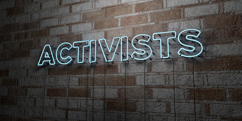 ACTIVISTS - Glowing Neon Sign on stonework wall - 3D rendered royalty free stock illustration.  Can be used for online banner ads and direct mailers..