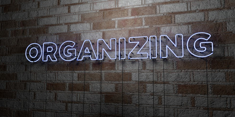 ORGANIZING - Glowing Neon Sign on stonework wall - 3D rendered royalty free stock illustration.  Can be used for online banner ads and direct mailers..