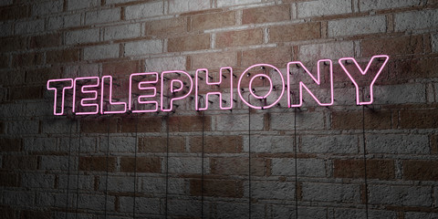 TELEPHONY - Glowing Neon Sign on stonework wall - 3D rendered royalty free stock illustration.  Can be used for online banner ads and direct mailers..
