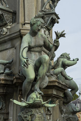 Fototapeta na wymiar Detail of the Neptune Fountain in Frederiksborg Castle in Hiller
