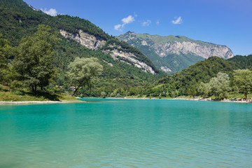 Fototapeta na wymiar Crystal clear alpine lake in Italy .