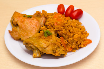 fried chicken with rice and tomatoes