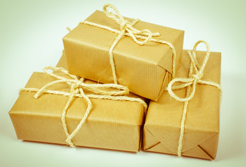 Rustic parcels gift box with kraft paper.