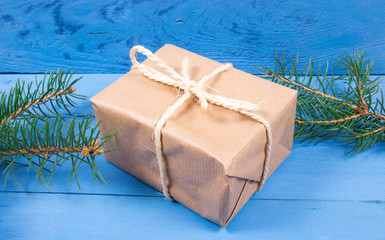 Rustic gift box with kraft paper. Christmas gift.