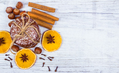 Gingerbread cookies, cinnamon and orange slices. Christmas decoration.