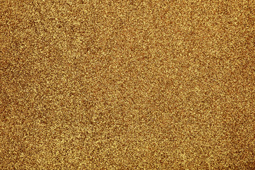 Focused golden texture glitter background