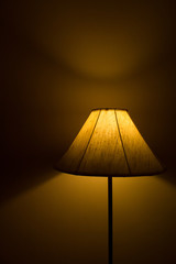 Standing lamp with light and shadow background