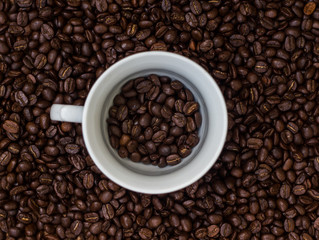 Coffee beans in a cup,cup of coffee with beans