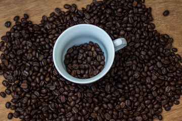 Coffee beans in a cup,cup of coffee with beans