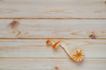 beautifully peeled tangerine on the table