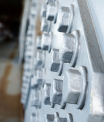 Gray painted hexagonal bolt heads