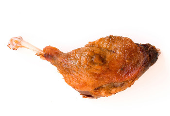 Roast duck leg on white background