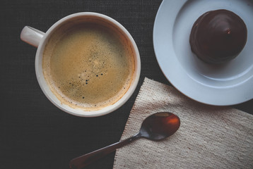 cup of hot coffee with chocolate Cake view from the top