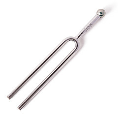Tuning fork isolated on white background