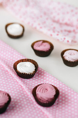 natural pink marshmallow closeup isolates on white