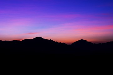 Beautiful silhouette landscape at night on a meadow on early winter