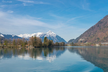 Obraz premium Reflection of Alps on the Brienz lake in Interlaken, Switzerland