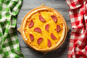 pepperoni pizza at wood