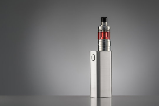 electronic cigarette over a gray background