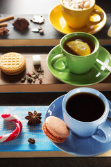 cup and saucer at colorful paper