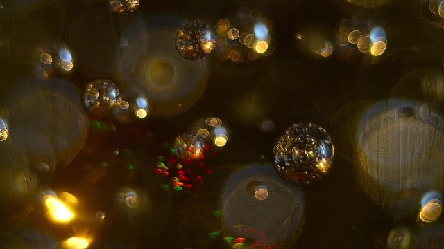 Sfere Dorate con luce in movimento - Auguri - Texture - Buon Natale
