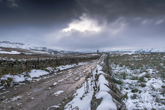 Autimn snow provides winter conditions in the hills above Askrigg in the Yorkshire Dales National Park, 