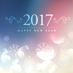 2017 happy new year background with bokeh effect