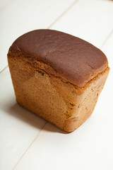 Bread on a white wooden background