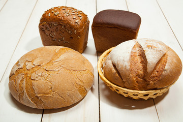 Bread on a white wooden background
