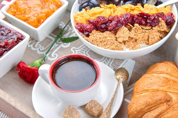 French breakfast on a wooden tray