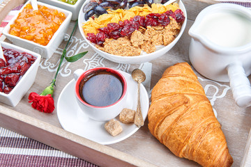 French breakfast on a wooden tray