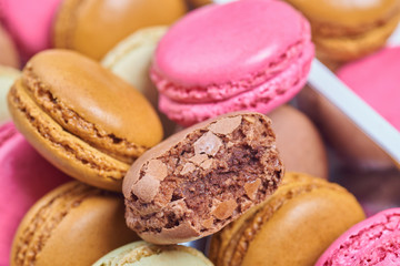 Colorful french macaroons in a box