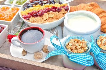 French breakfast on a wooden tray