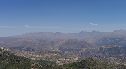 Fototapeta na wymiar Panorama of Sierra Nevada. A mountain range in the region of Andalusia in Spain