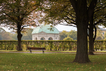 Park bench in early autumn in Munich Bavaria