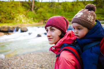 The mother and son are traveling.