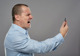 Furious businessman yelling