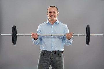 Businessman with barbell