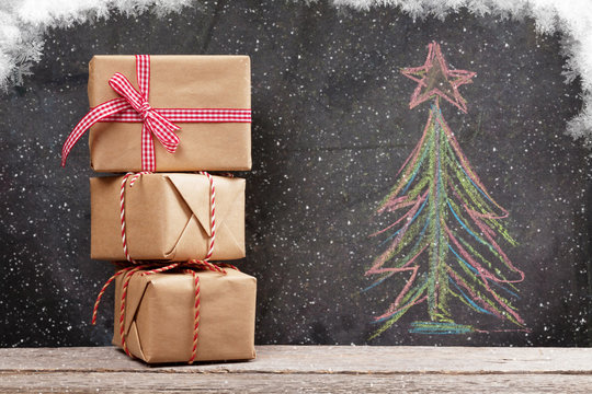 Christmas gift boxes and hand drawn xmas fir tree