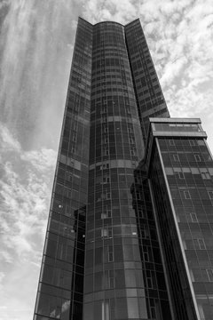 KIEV, UKRAINE - NOVEMBER 5: Office building. modern glass silhouette of skyscraper. Black and white.
