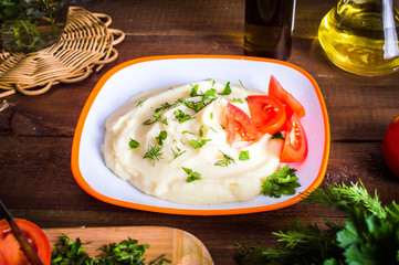 mashed potatoes on a wooden background