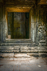 Fototapeta na wymiar Angkor, rovine delle gallerie del Ta Phrom