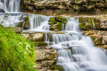 Fototapeta na wymiar Gradas de Soaso. Waterfall in the spanish national park Ordesa 