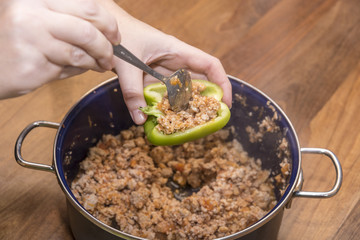 Peppers and tomatoes stuffed with meat