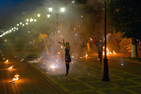 July 07, 2013: Photo of fire performance on the city street. Che