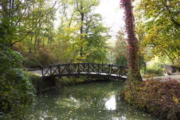 Ukraine. Sophia Park in Uman. Wooden bridge over a stream.