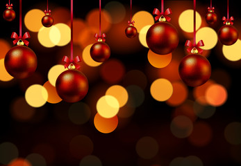 Hanging Christmas balls on bokeh background
