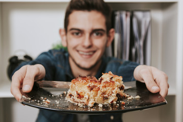 young eating cake at home