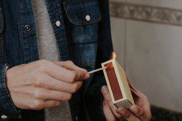 closeup hands turning them matches