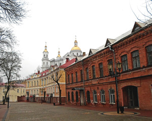Fototapeta na wymiar Old city street near the Holy Dormition Cathedral, Vitebsk, Belarus